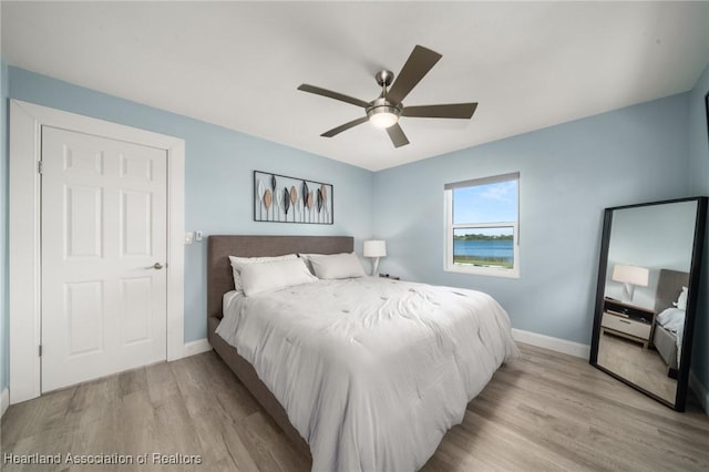 1622 Dinner Dr, Sebring, FL 33870 - bedroom featuring ceiling fan, light wood-type flooring, and baseboards