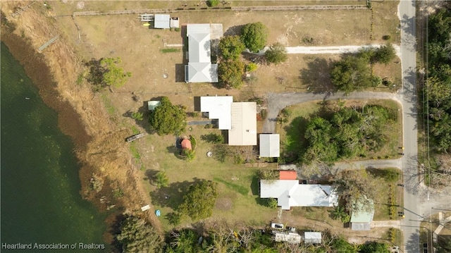 aerial view with a water view and a rural view