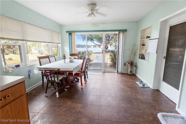 dining area with ceiling fan