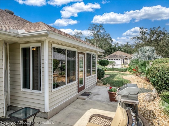 view of patio with a grill