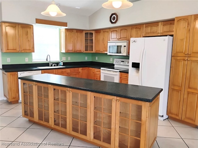 kitchen with glass insert cabinets, dark countertops, white appliances, and a sink