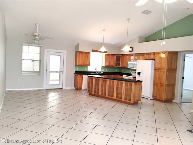 kitchen featuring light tile patterned floors, white appliances, visible vents, a ceiling fan, and dark countertops