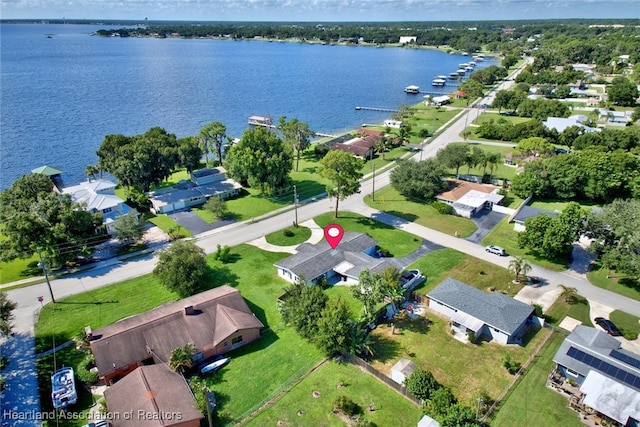 bird's eye view with a water view