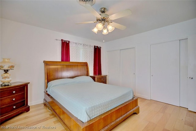 bedroom featuring light hardwood / wood-style floors and ceiling fan