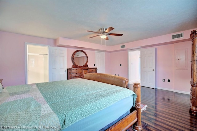 bedroom with ceiling fan and dark hardwood / wood-style flooring