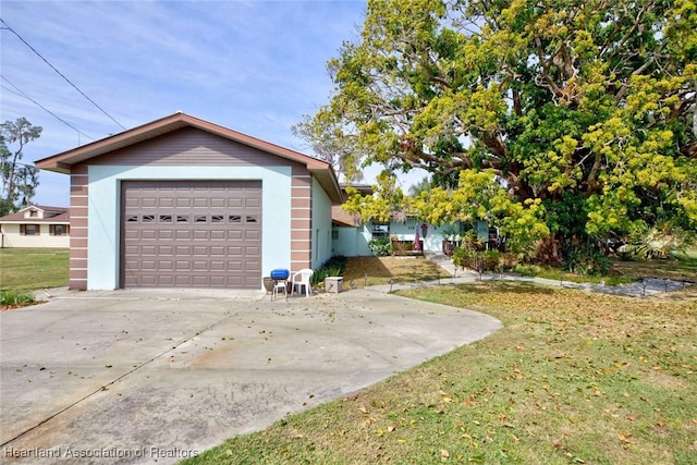 garage with a lawn