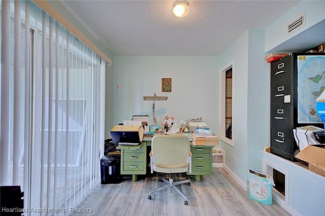 office space featuring light hardwood / wood-style flooring