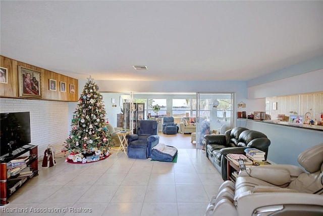 living room with light tile patterned floors