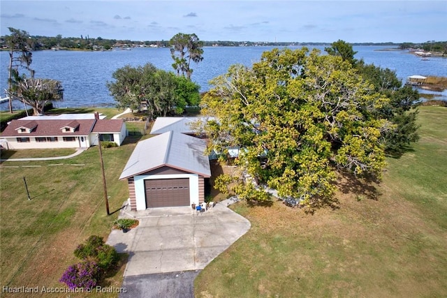 drone / aerial view with a water view