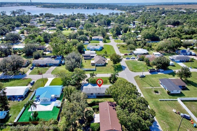 bird's eye view with a water view