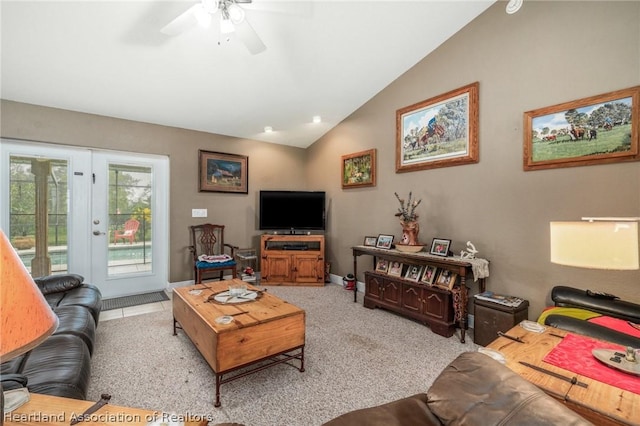 living room featuring ceiling fan, french doors, light colored carpet, and vaulted ceiling