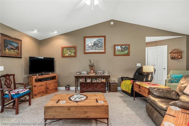 living room featuring light colored carpet, ceiling fan, and lofted ceiling