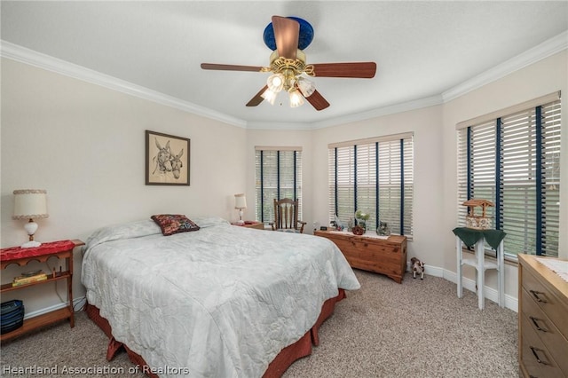 bedroom with ceiling fan, light colored carpet, and crown molding