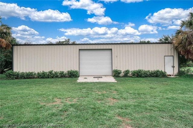 garage with a yard