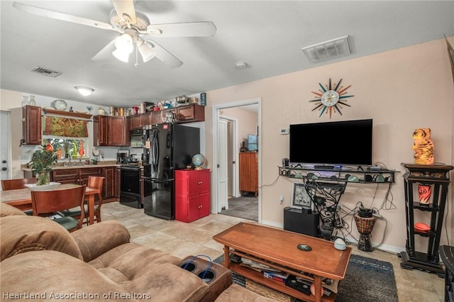 living room with ceiling fan