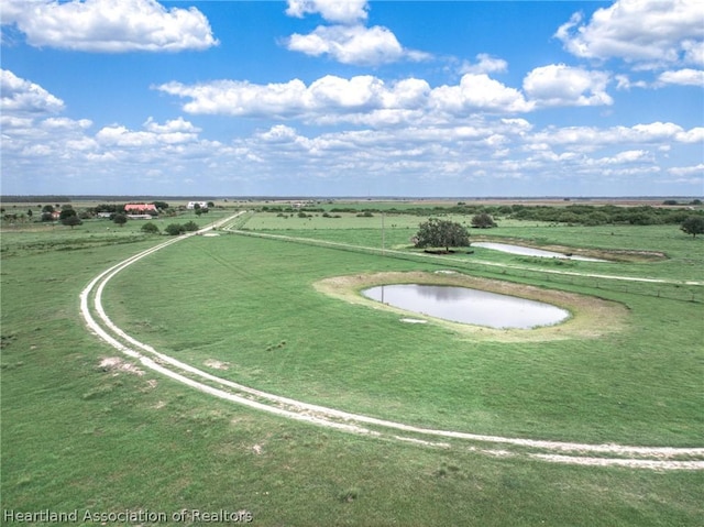 bird's eye view featuring a rural view and a water view