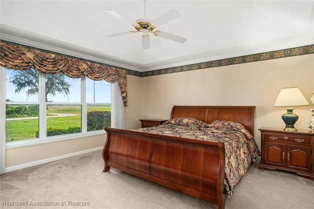 bedroom featuring ornamental molding, ceiling fan, carpet flooring, and baseboards