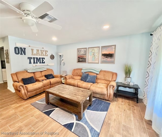 living room with ceiling fan, recessed lighting, visible vents, baseboards, and wood tiled floor