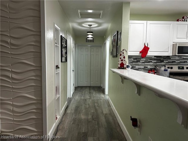 hall featuring dark wood-type flooring