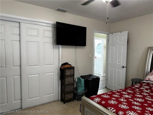 bedroom featuring a closet and ceiling fan