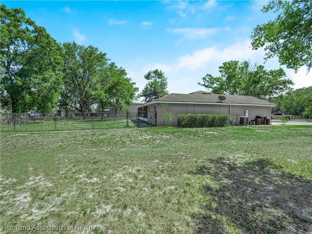 1954 Heard Rd, Wauchula, FL 33873 - view of yard featuring fence and central air condition unit