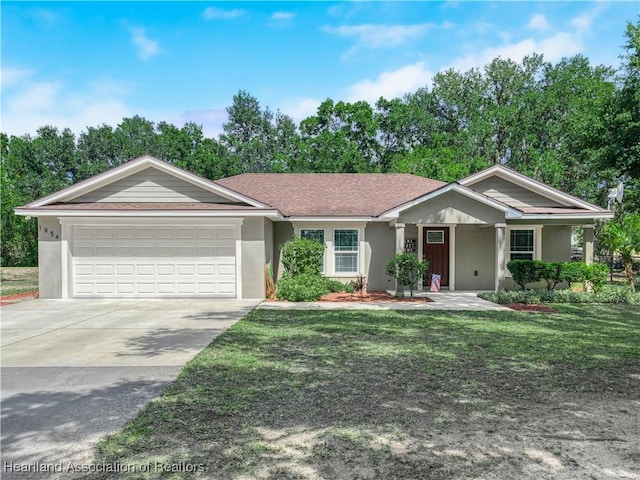 1954 Heard Rd, Wauchula, FL 33873 - ranch-style house with stucco siding, concrete driveway, a porch, and a garage