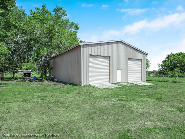 1954 Heard Rd, Wauchula, FL 33873 - detached garage with fence