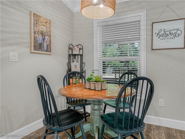 1954 Heard Rd, Wauchula, FL 33873 - dining space with wood finished floors, ornamental molding, and baseboards