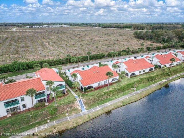 drone / aerial view featuring a water view