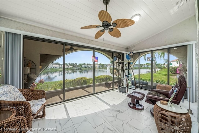 sunroom featuring a ceiling fan, wooden ceiling, a water view, and vaulted ceiling