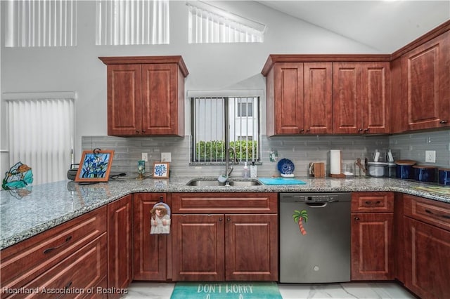 kitchen with backsplash, light stone countertops, vaulted ceiling, stainless steel dishwasher, and a sink