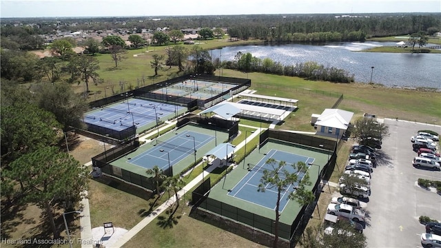 drone / aerial view with a water view