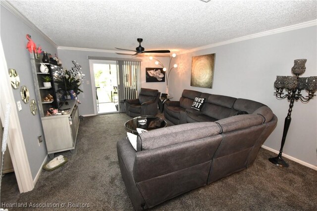 living area featuring dark colored carpet, crown molding, and a textured ceiling