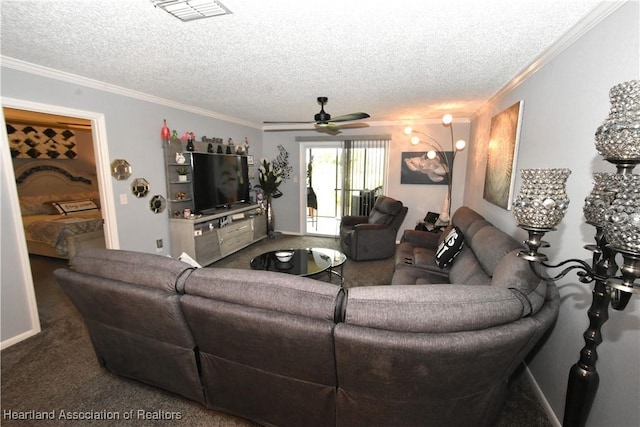 living room featuring carpet floors, visible vents, ornamental molding, and a textured ceiling