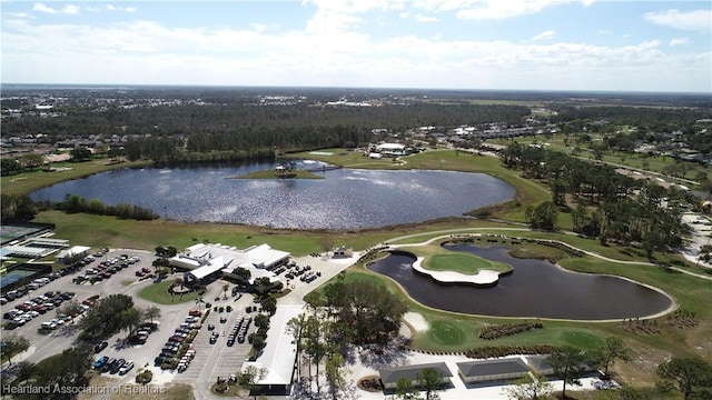 aerial view featuring golf course view and a water view