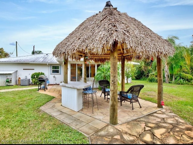 view of patio / terrace with grilling area and central AC