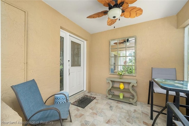 1904 Mulligan Rd, Sebring, FL 33872 - doorway to property with stucco siding, ceiling fan, and a patio