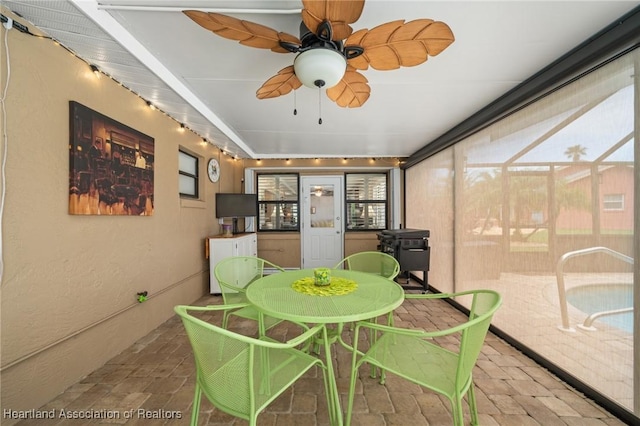 1904 Mulligan Rd, Sebring, FL 33872 - sunroom featuring outdoor dining area and ceiling fan