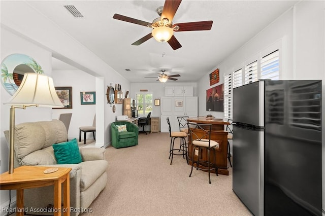 1904 Mulligan Rd, Sebring, FL 33872 - living room featuring a ceiling fan and light carpet