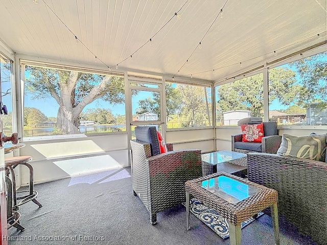 sunroom / solarium with an outdoor hangout area