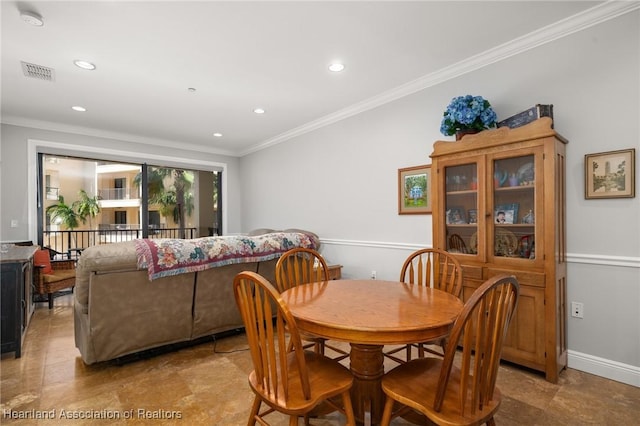 dining room with ornamental molding