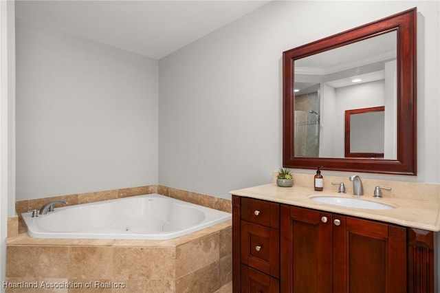 bathroom with shower with separate bathtub and vanity