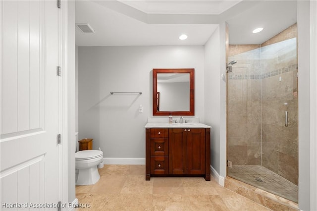 bathroom with toilet, vanity, crown molding, and walk in shower