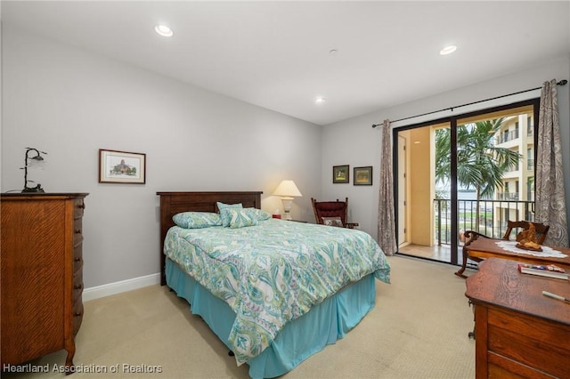 bedroom featuring light carpet and access to outside