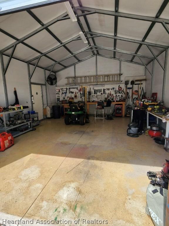 garage featuring a workshop area