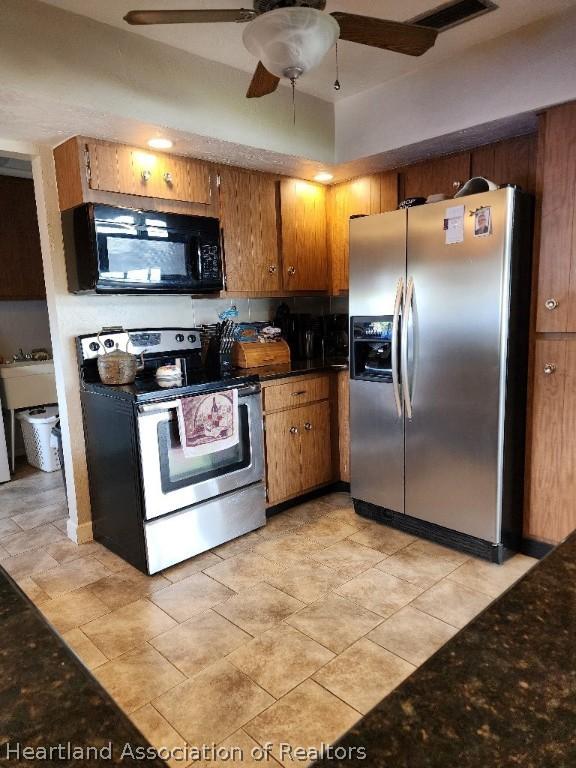 kitchen featuring ceiling fan and appliances with stainless steel finishes