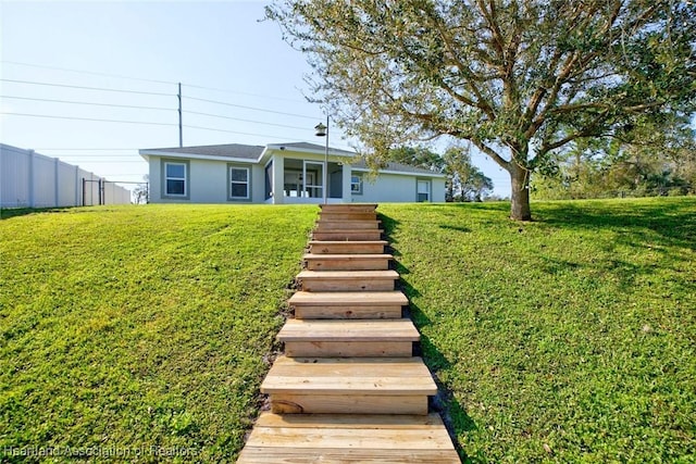 view of front facade with a front yard