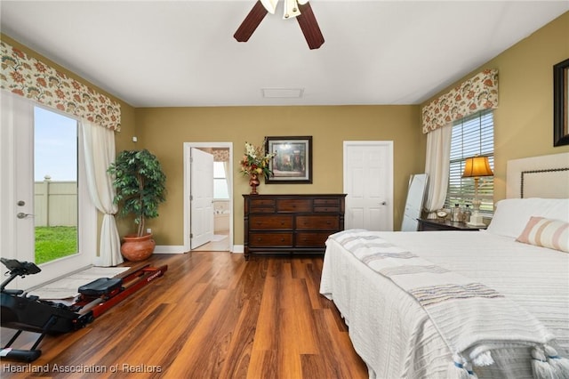 3038 Cedora Ter, Sebring, FL 33870 - bedroom featuring wood finished floors, connected bathroom, and ceiling fan