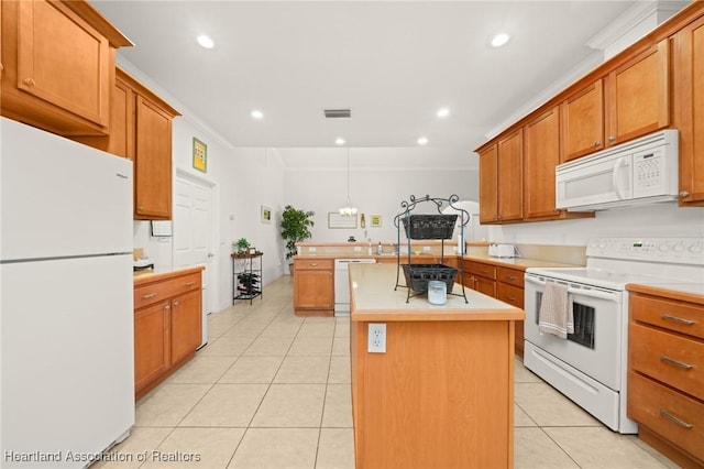 3038 Cedora Ter, Sebring, FL 33870 - kitchen with white appliances, light countertops, light tile patterned floors, a peninsula, and recessed lighting