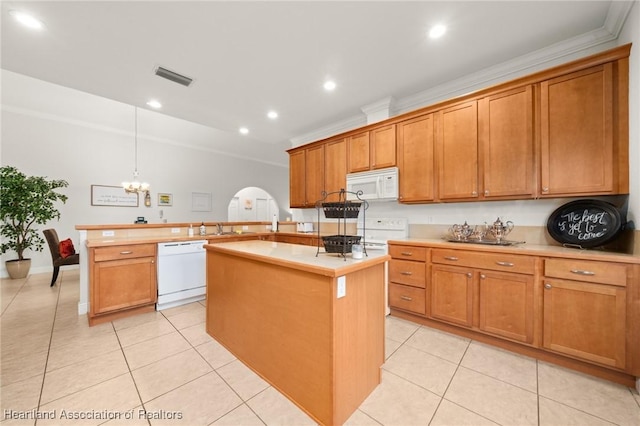 3038 Cedora Ter, Sebring, FL 33870 - kitchen featuring white appliances, a peninsula, light countertops, light tile patterned flooring, and ornamental molding